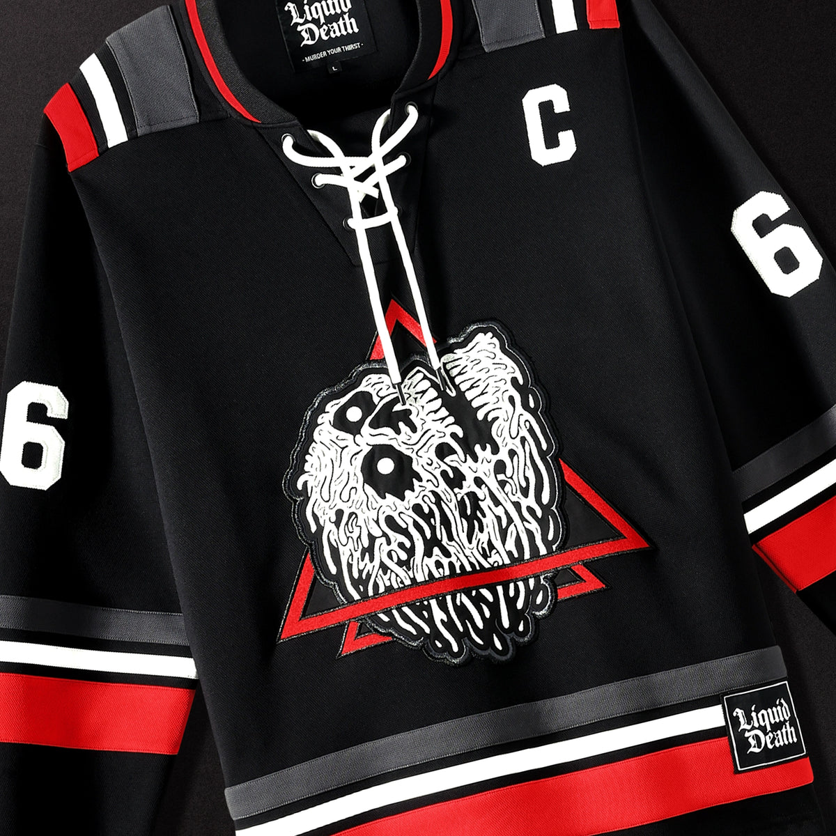 Blackhawks black skull jersey best sale