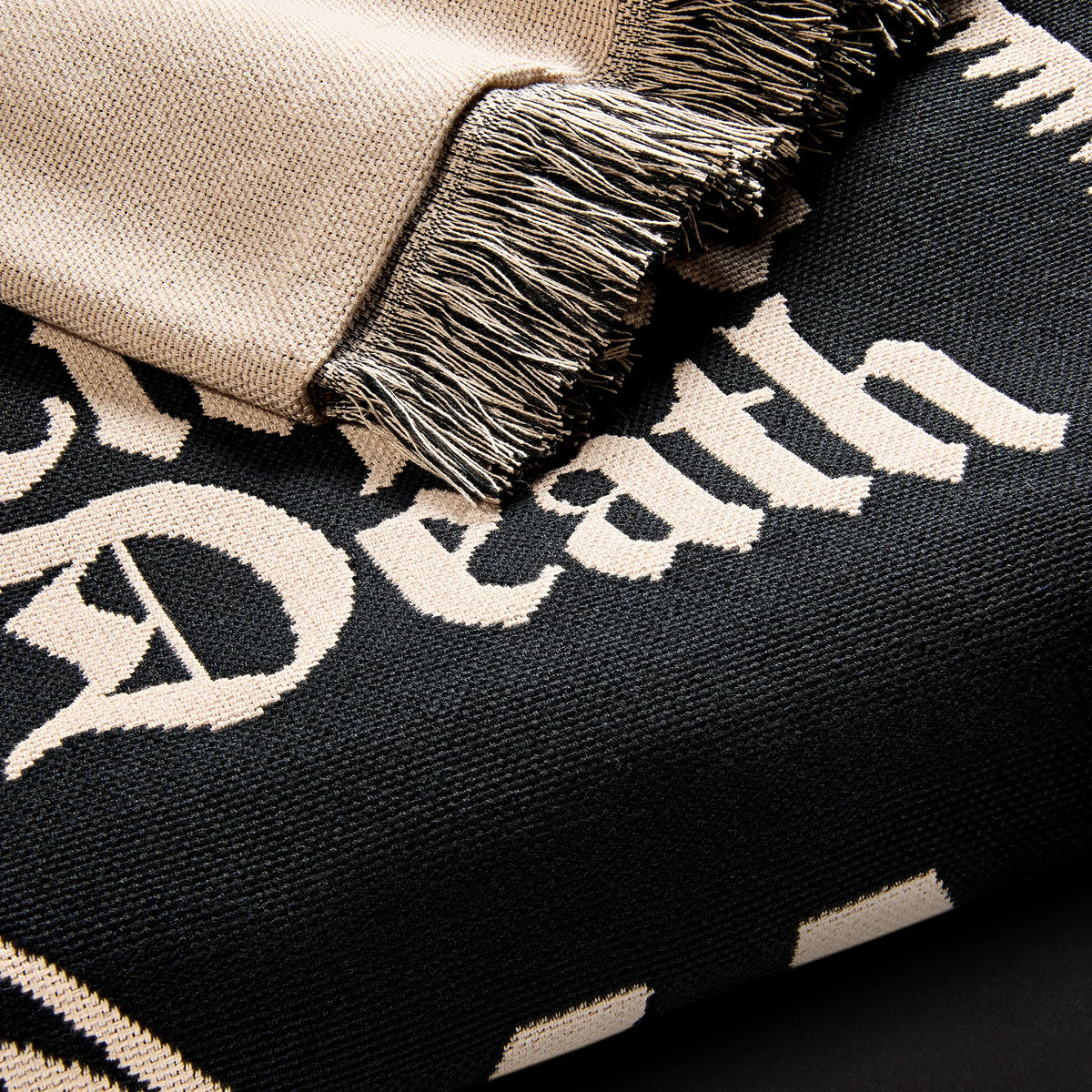 Death Charmer Woven Blanket