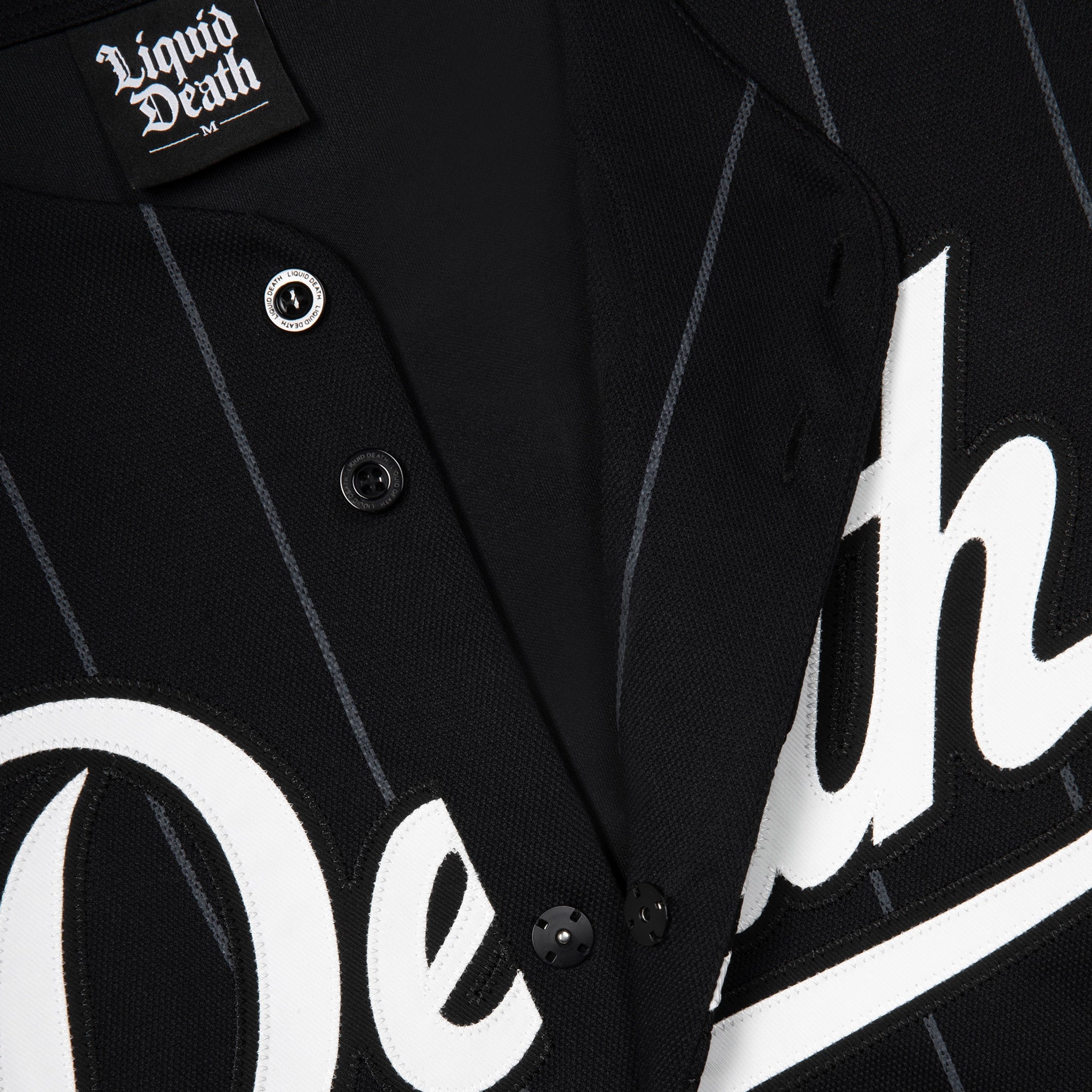 Black pinstripe jacket with 'Liquid Death' branding on a white background