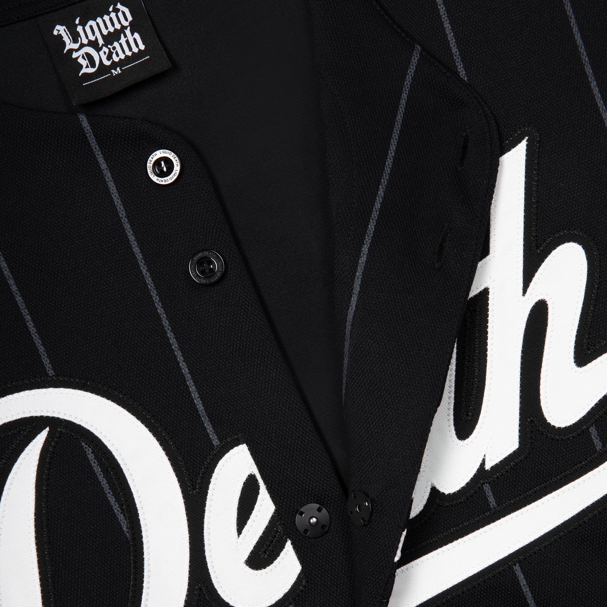 Black pinstripe jacket with 'Liquid Death' branding on a white background