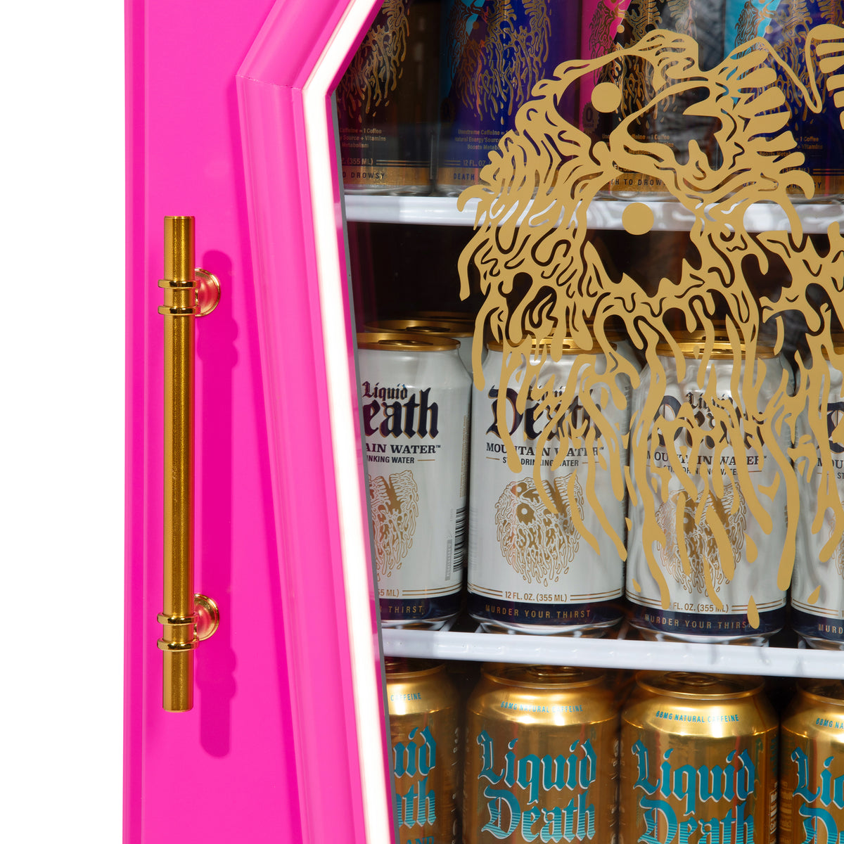 Close-up of the Dreamy Death Mini-Fridge gold handle and skull design on the glass door