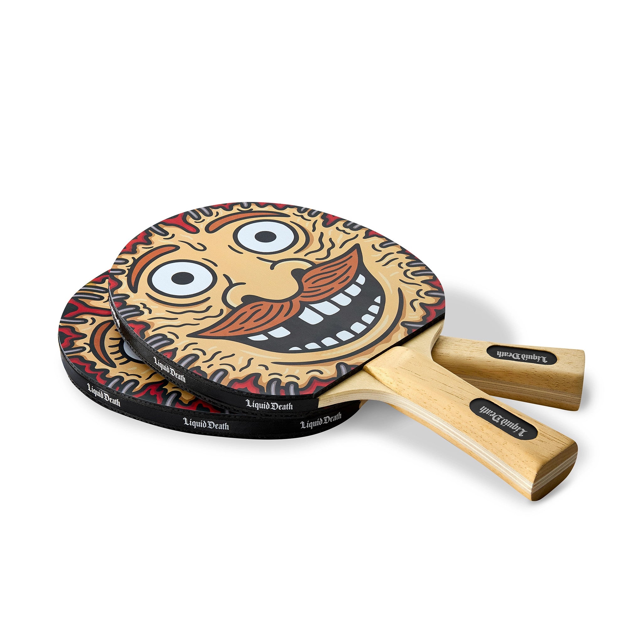 Two ping pong paddles with a cartoon face design on a white background