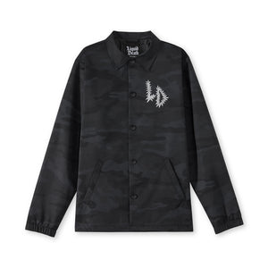 Black camouflage jacket with Liquid Death logo on a white background