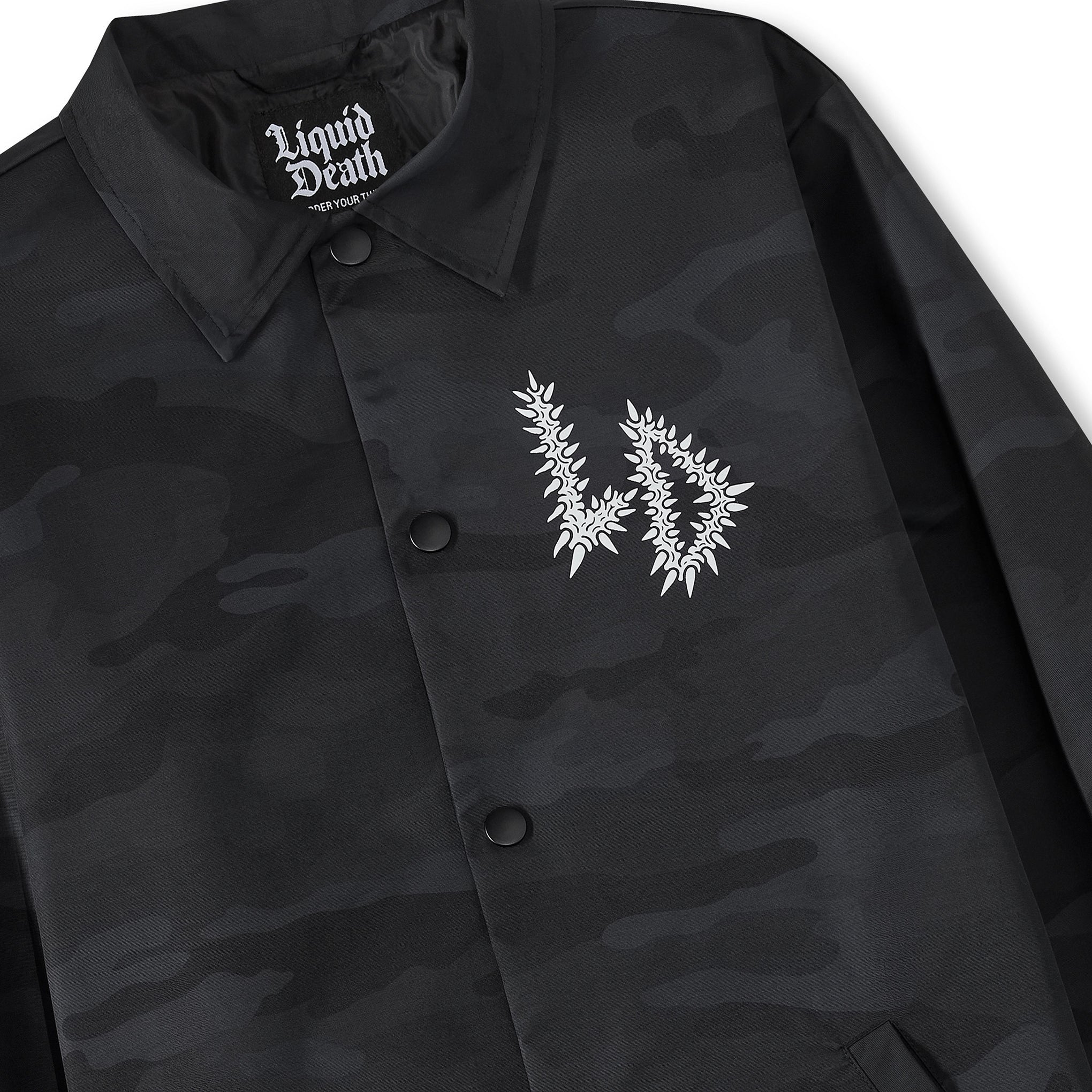 Black camouflage jacket with Liquid Death logo on a white background