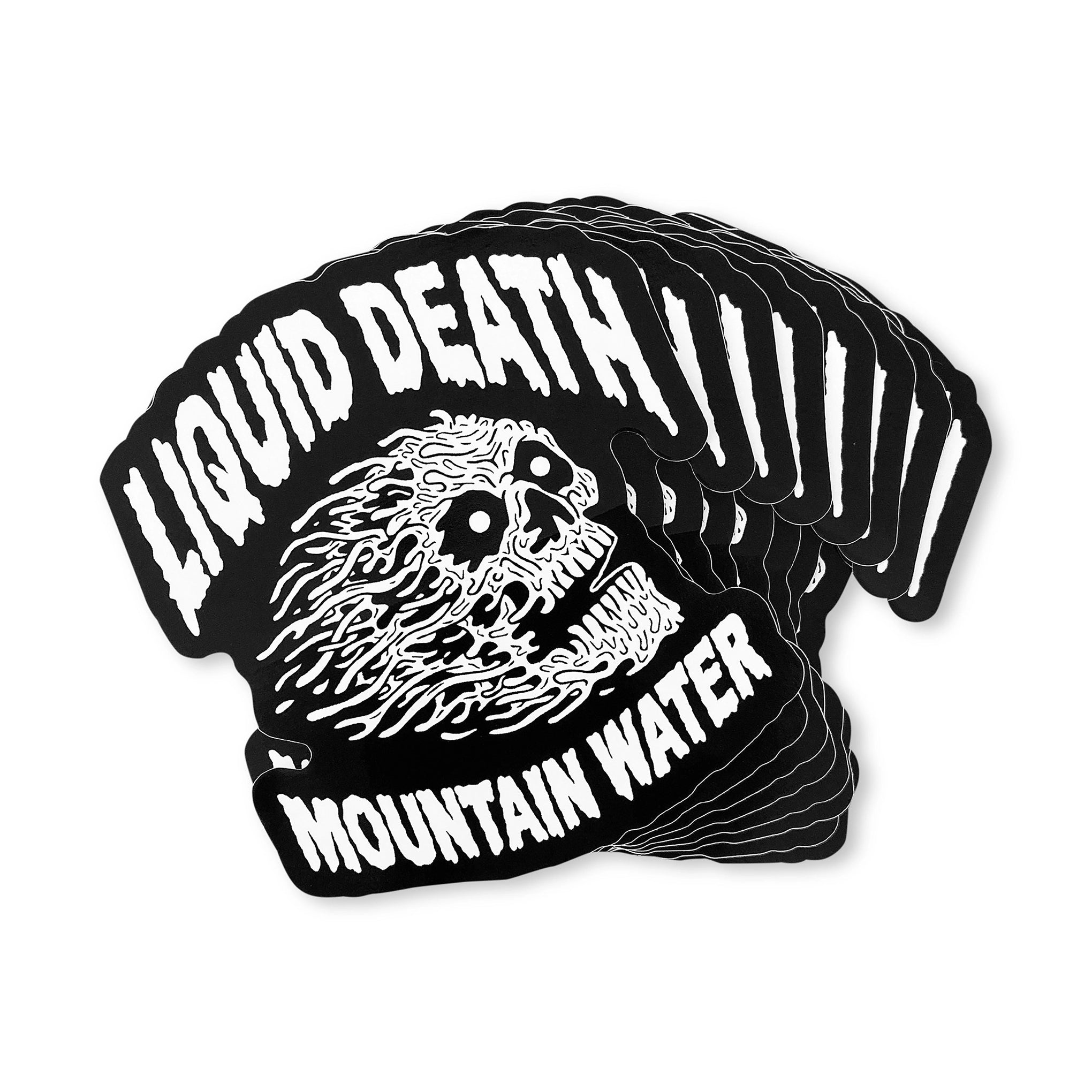 Stack of 'Liquid Death Mountain Water' stickers with a graphic design on a white background