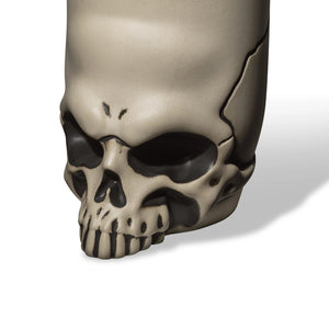Skull-shaped container on a white background