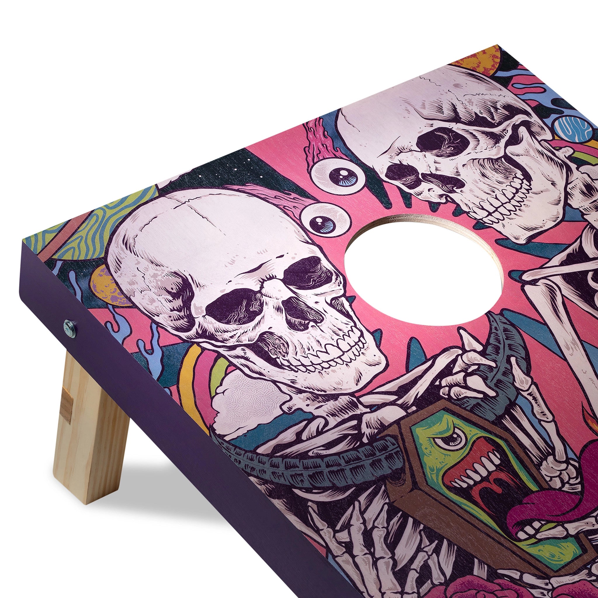Cornhole board with colorful skull and skeleton design on a white background