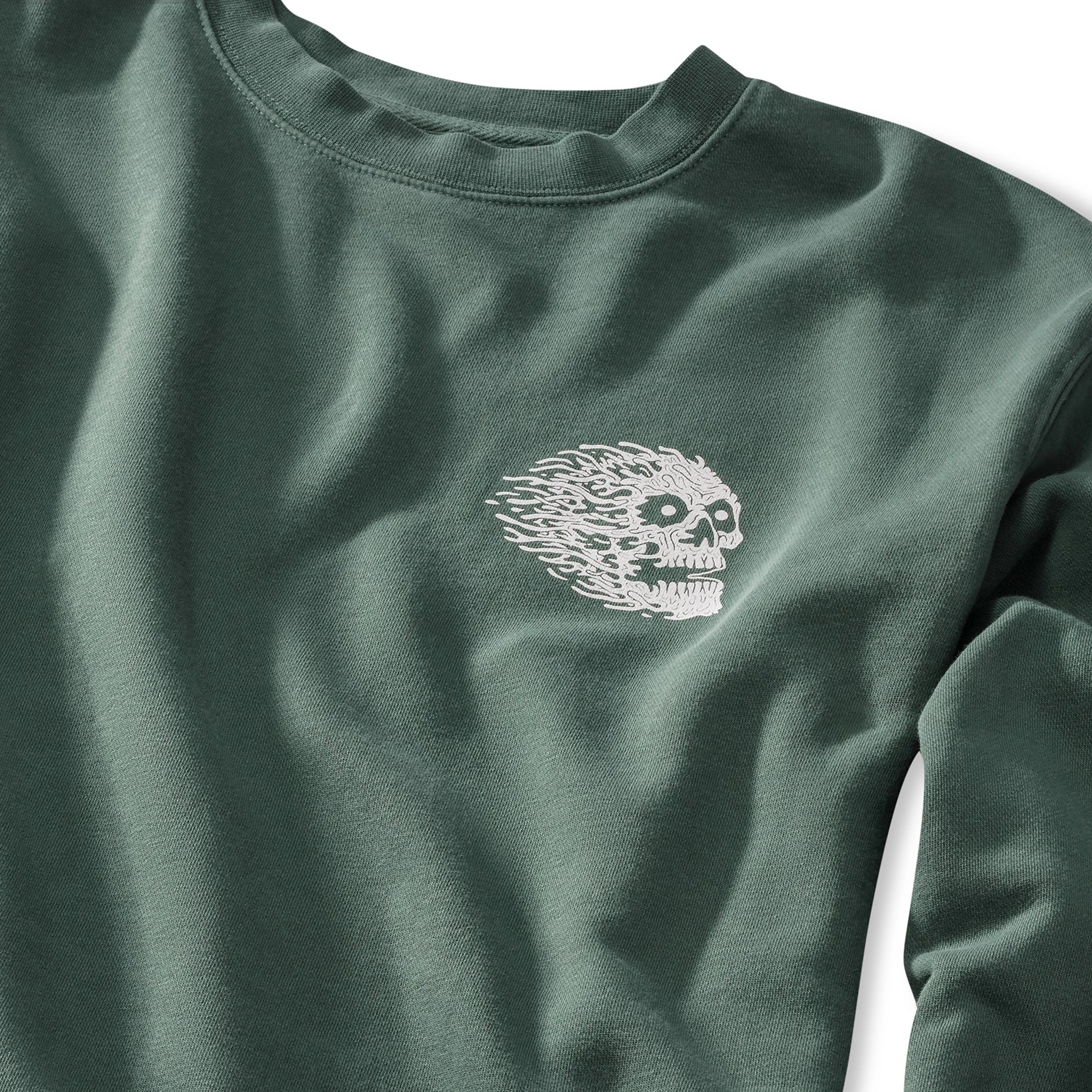 Green sweatshirt with a white skull design on a white background Front